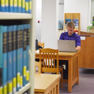 Student studying in the library